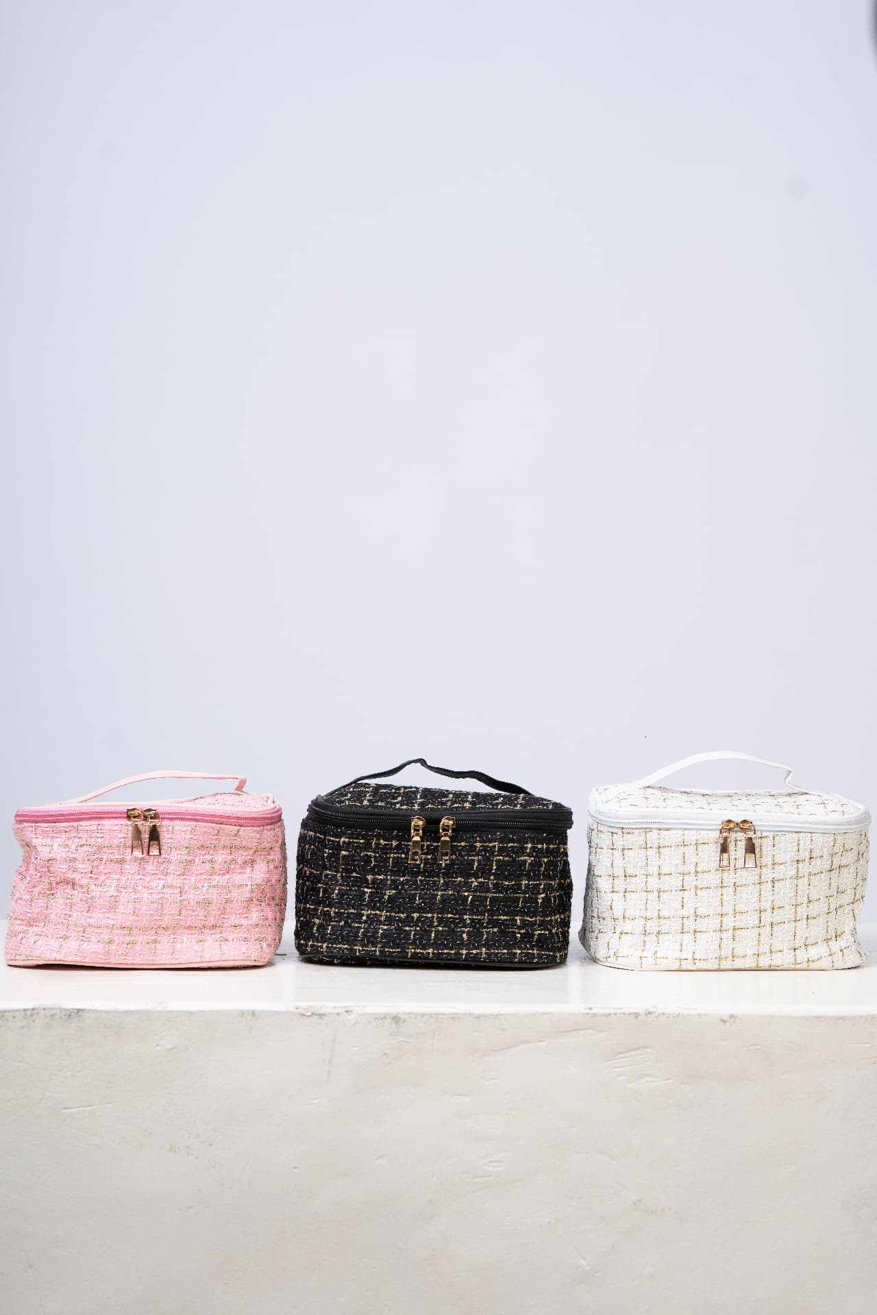 ALMA Mini Travel Makeup Bags in pink, black and white